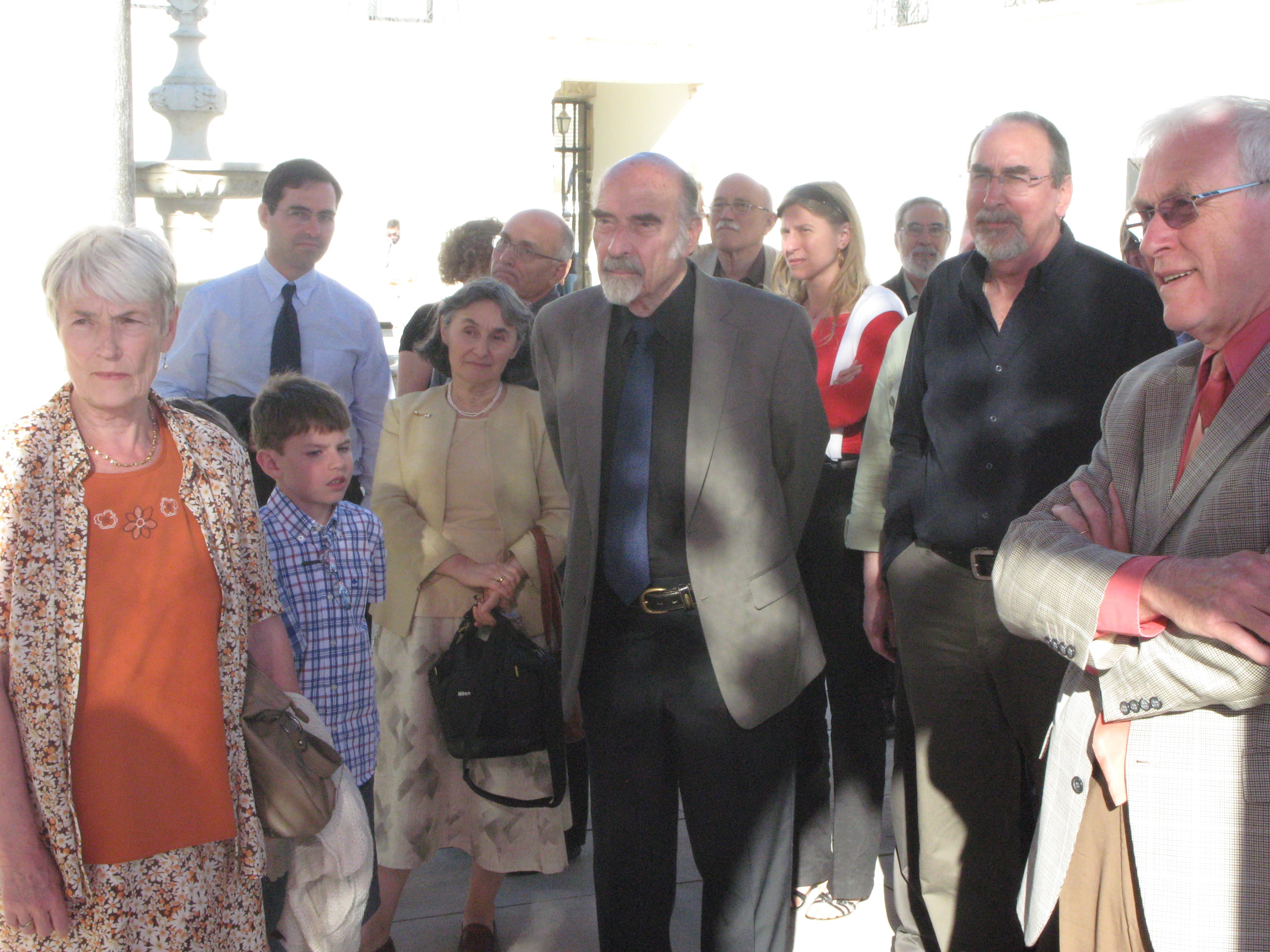 Bernhard Banaschewski standing among a group of conference participants outdoors